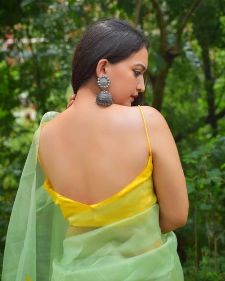 Yellow Color Strap Blouse Design with Green Organza Saree