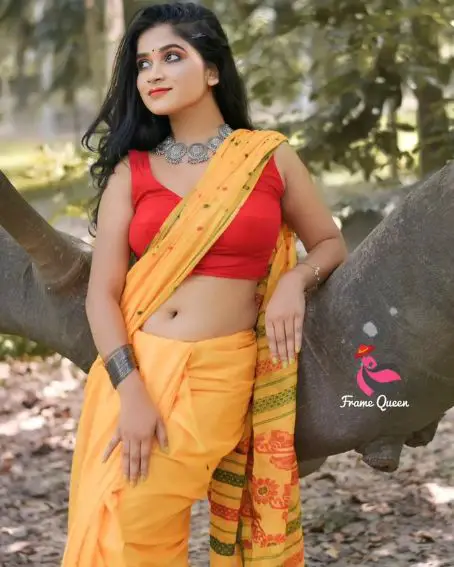 Yellow Cotton Saree with Red Sleeveless Blouse