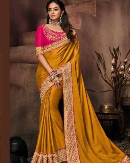 Yellow Embroidered Silk Saree With Rani Pink Blouse