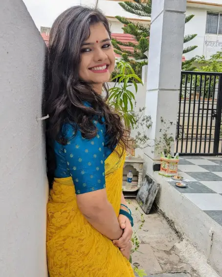 Yellow Fancy Saree With Blue Blouse
