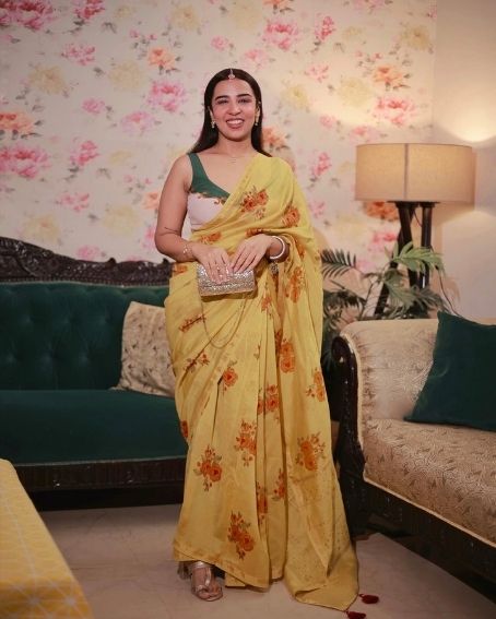Yellow Floral Saree with Double Color Sleeveless Blouse