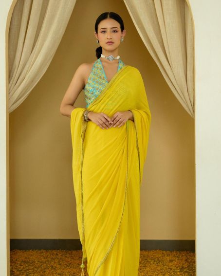 Yellow Pure Silk Chiffon Saree With Embroidered Halter Neck Blouse