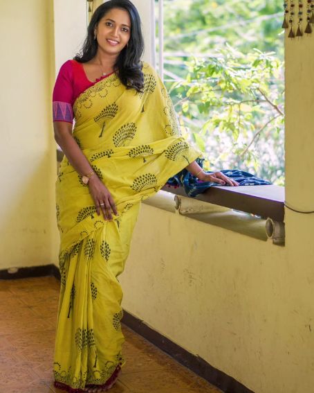 Yellow Saree with Pink Blouse