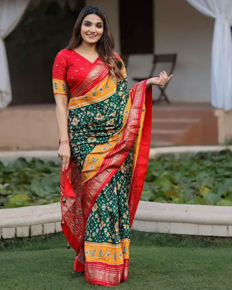 Attractive Green And Red Patola Printed Dola Silk Foil Work Saree