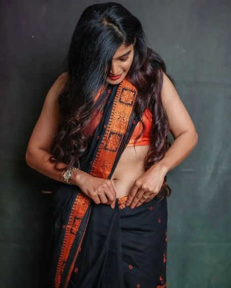 Black Cotton Saree with Bricks Red Sleeveless Blouse