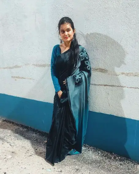 Black Saree with Blue Full Sleeve Blouse