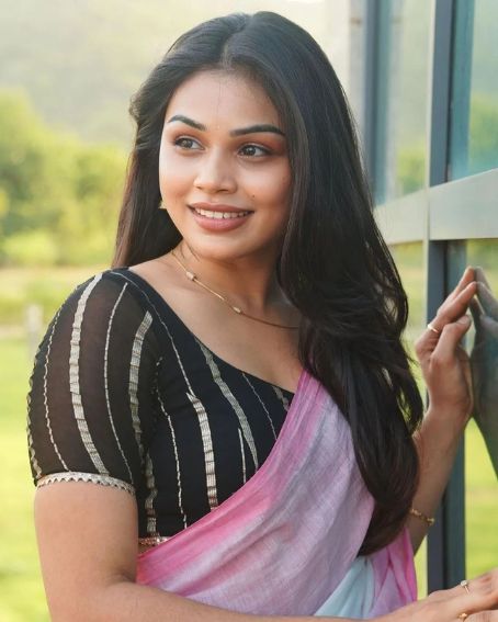 Black Stripes Blouse with Pink Saree