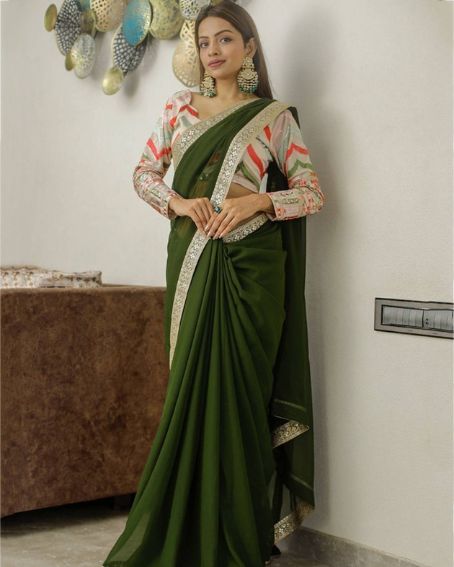 Desirable Mehendi Green Georgette Embroidered Border Party Wear Saree