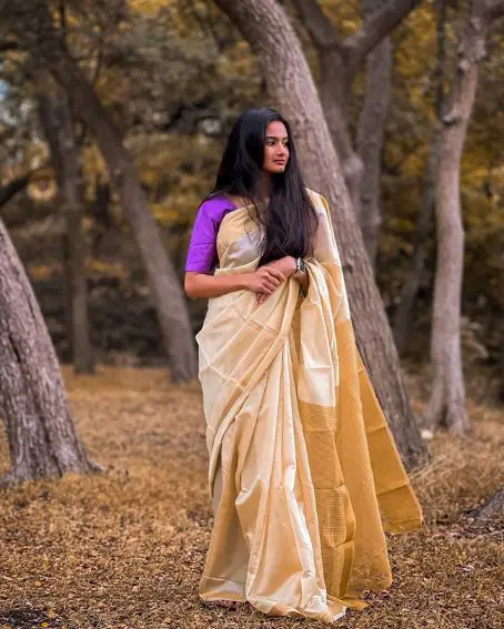 Gold Color Saree with Violet Blouse