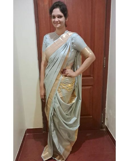 Gray Full Neck Blouse With Fancy Saree