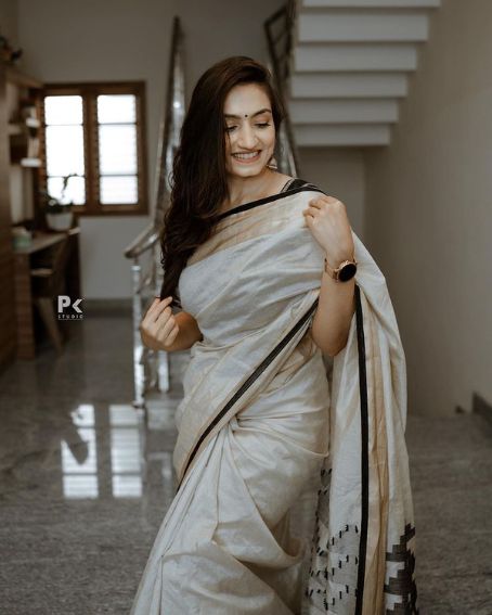 Gray Net Saree With Black Strap Blouse