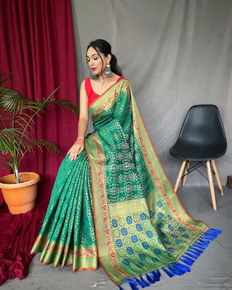 Green Color Bandhej Patola Silk Saree with Red Sleeveless Blouse