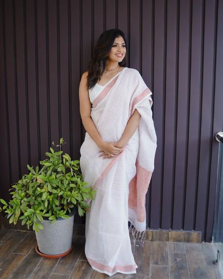 Handloom Linen Saree with Copper Zari Border and Stripe