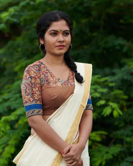 Kerala Kasavu Saree with Kalamkari Blouse