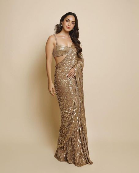 iara Advani in Manish Malhotra's Bronze Gold Metallic Saree