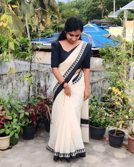 Off White Kerala Saree with Black Blouse