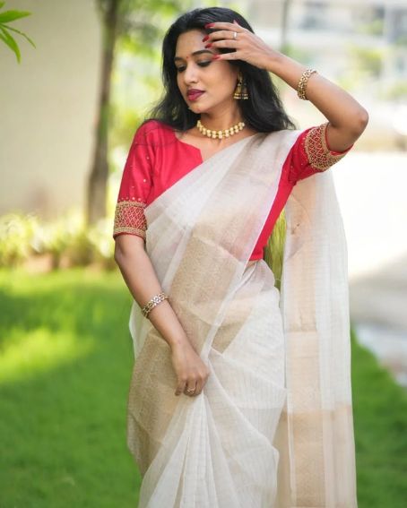 Off White Organza Saree With Red Blouse With Stone Work