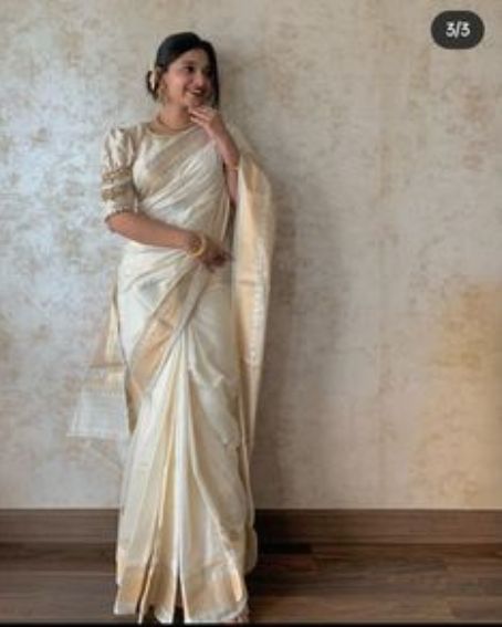 Off White Saree in Silk with Gold Border