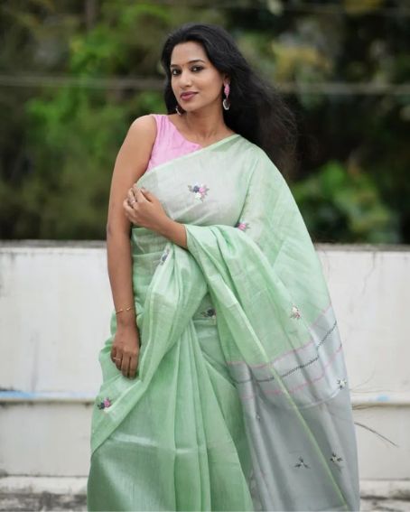 Parrot Green Linen Saree With Pink Boatneck Blouse