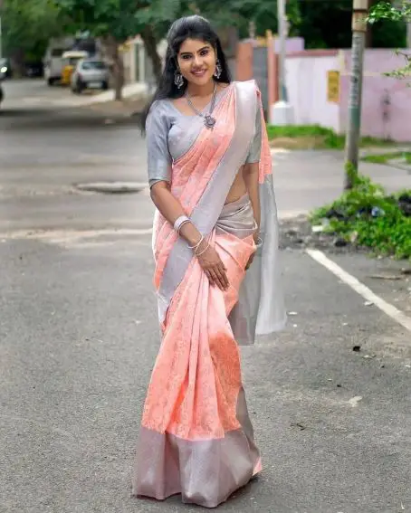 Peach Kota Doria Silk Saree with Silver Blouse