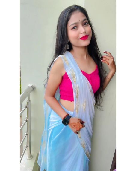 Pink Sleeveless Blouse with Sky Blue Saree