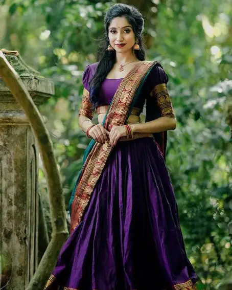 Purple Latest Kanchi Pattu Half Sarees with Kutch Blouse Design