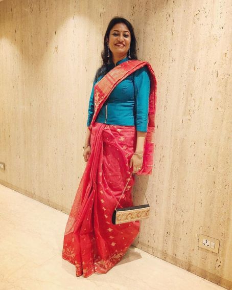 Red and Green A Dhakai Jamdani Saree with a Bomber Jacket Style Blouse