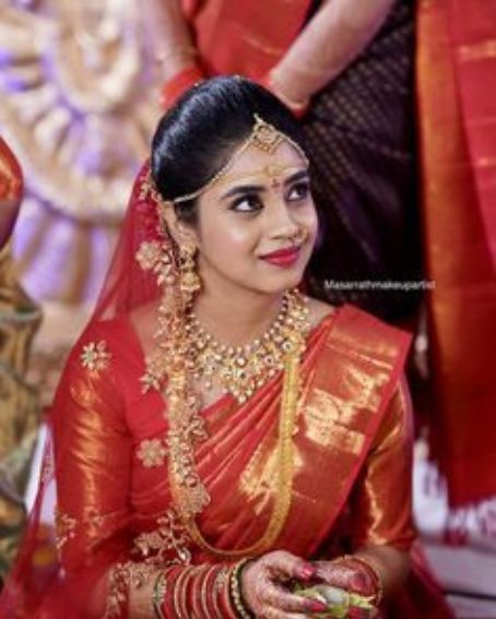 South Indian Bride Looks Gorgeous In Red Saree