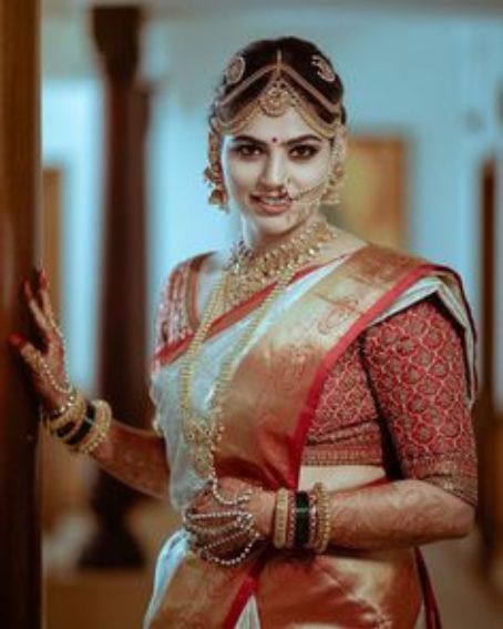 White Coloured Saree With Red Blouse For Talambralu