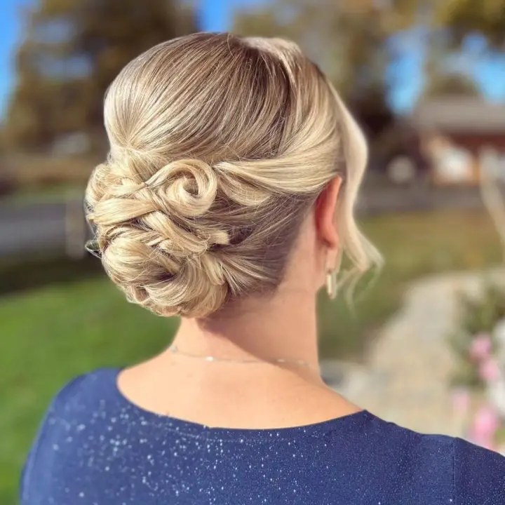 low updo with a braided style for Christmas look